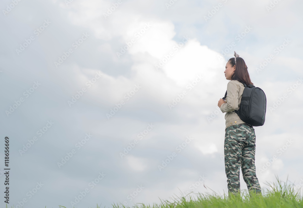 Carefree woman having a good time at the meadow Carefree woman having a good time at the meadow