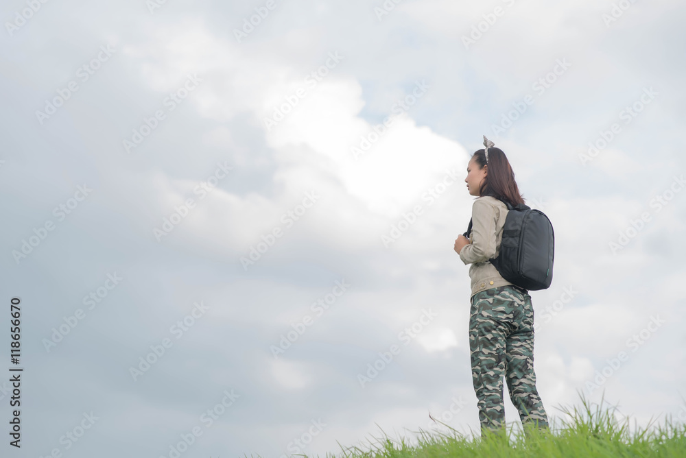 Carefree woman having a good time at the meadow Carefree woman having a good time at the meadow