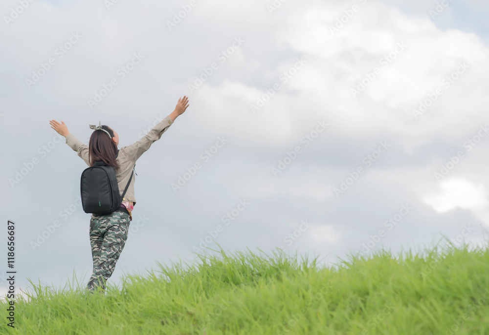 Carefree woman having a good time at the meadow Carefree woman having a good time at the meadow