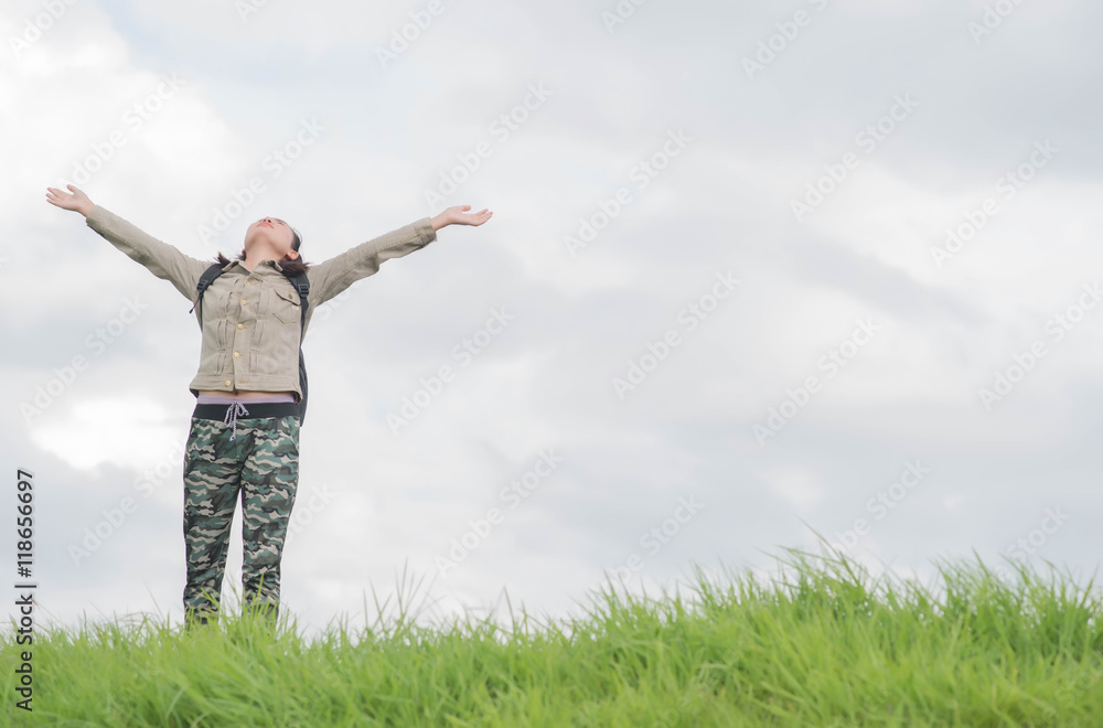 Carefree woman having a good time at the meadow Carefree woman having a good time at the meadow