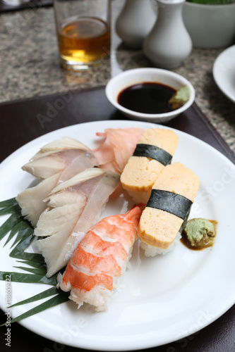 Seafoods Sushi on white dish in the restaurant.