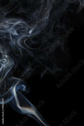 Abstract blue smoke from aromatic sticks.