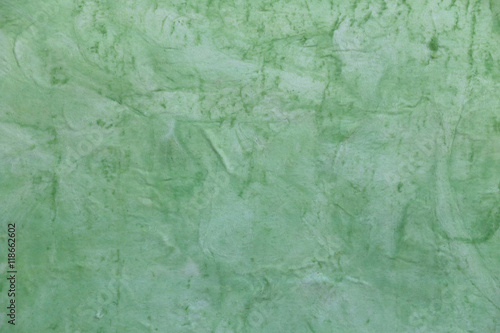 Concrete surface painted green color.