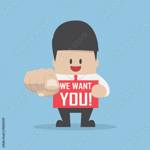 Businessman pointing finger towards you with word we want you