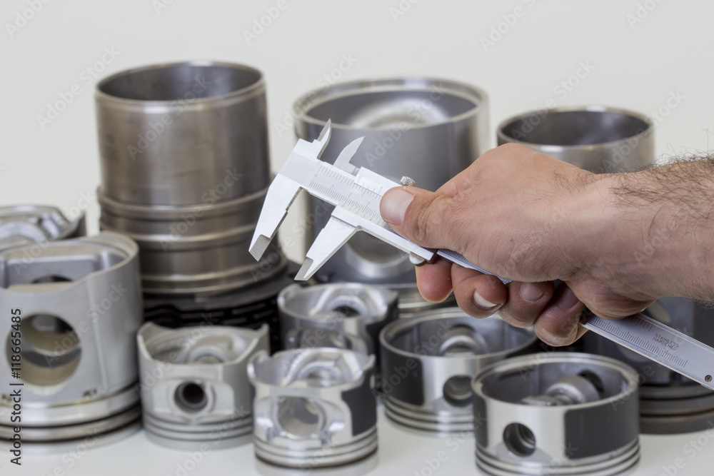 auto piston parts white background isolated auto piston parts white background isolated