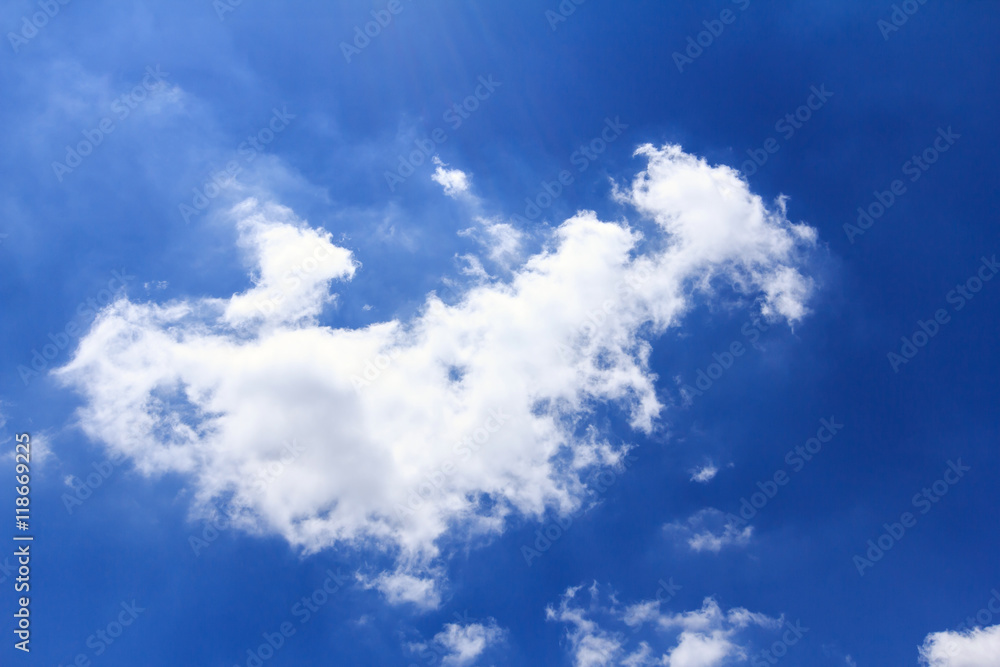 Fototapeta premium Blue sky background with white clouds. The vast blue sky and clouds sky on sunny day. White fluffy clouds in the blue sky.