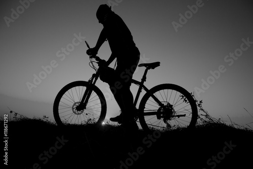 sunset and silhouette backlight bikers