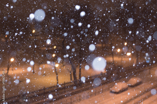 snow background in the night city