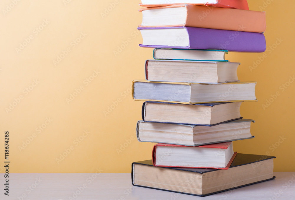 Stack of colorful books. Education background. Back to school. Copy space for text. Stack of colorful books. Education background. Back to school. Copy space for text.