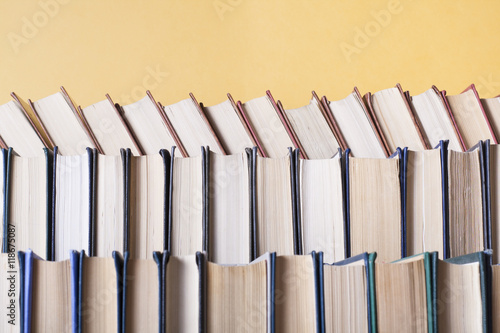 Stack of colorful books. Education background. Back to school. Copy space for text.