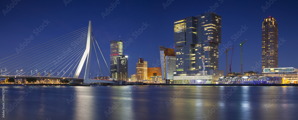 Fototapeta premium Rotterdam Panorama. Panoramic image of Rotterdam, Netherlands during twilight blue hour.