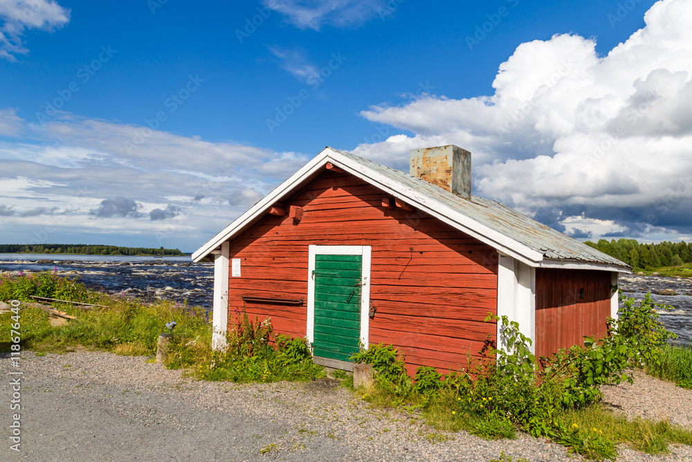 Fisherman's hut along the Tornionjoki river on the border of Sweden and Finland Fisherman's hut along the Tornionjoki river on the border of Sweden and Finland