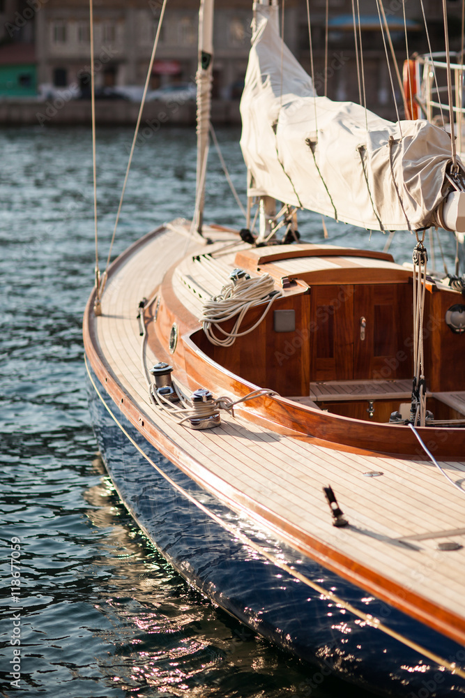 Sailing yacht against sunset. Luxury yachts.