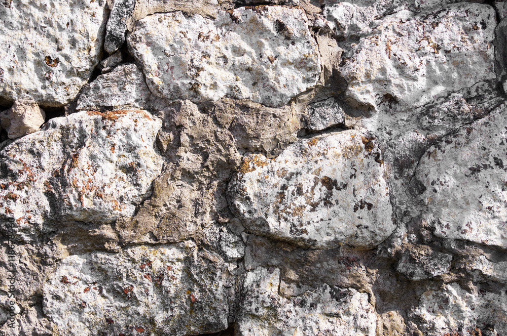 Fototapeta premium This is the real image of fragments of the old walls of the Vyborg Castle. Vyborg Castle is a Swedish-built medieval fortress around which the town of Viborg evolved.