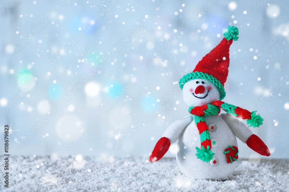 Cute snowman on Christmas background. Snow effect Cute snowman on Christmas background. Snow effect