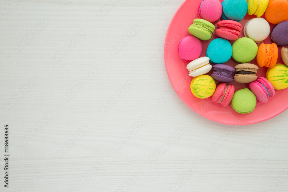 Colorful france macarons on white table background Colorful france macarons on white table background