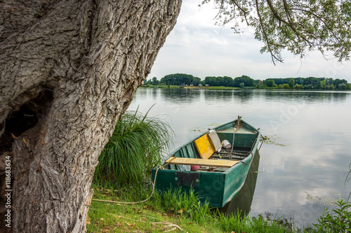 Green boat on the mantova lake