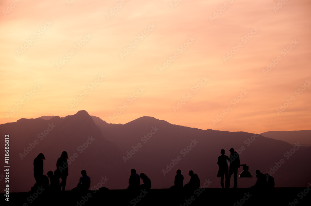 People enjoying sunset.
