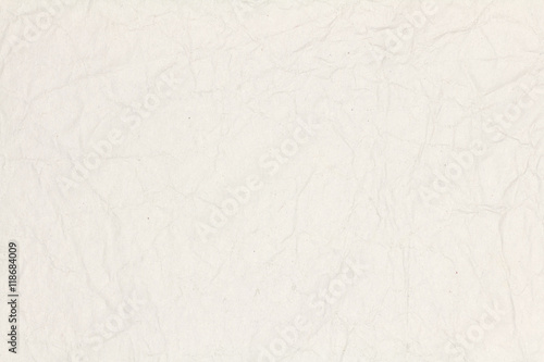 Recycled crumpled light brown paper texture or paper background for design with copy space for text or image.