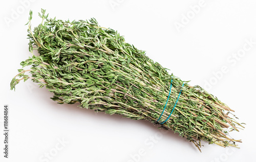 bunch of fresh cut thyme herb on white