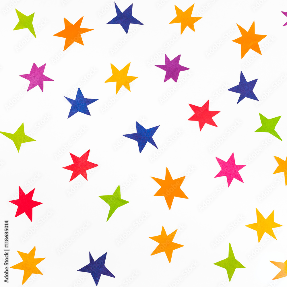 top view of various stars carved from color paper top view of various stars carved from color paper