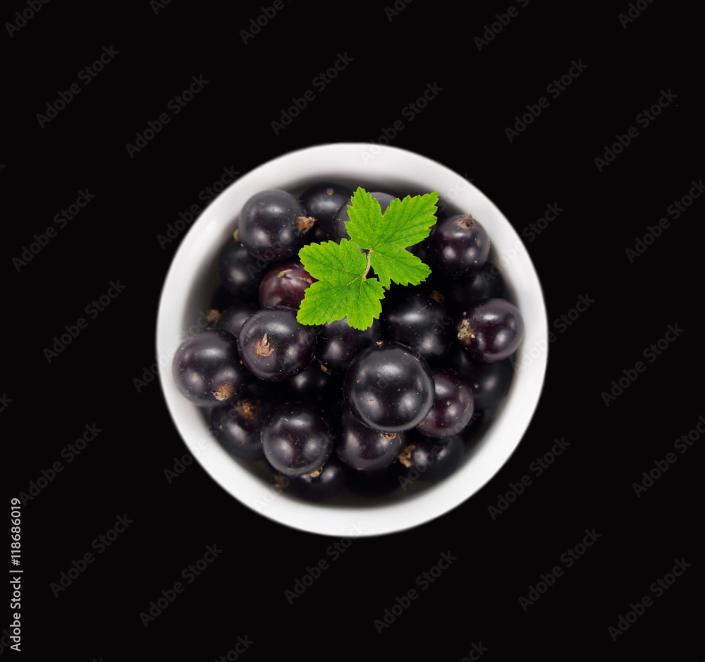 Ripe and tasty black currant isolated on black background. Ripe and tasty black currant isolated on black background.