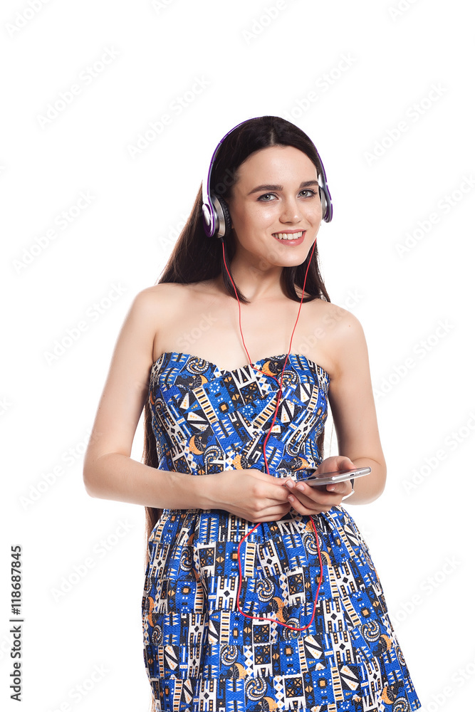 beautiful cute brunette girl with headphones on a white backgrou beautiful cute brunette girl with headphones on a white backgrou