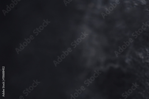 Black Grunge textured background with scratches.