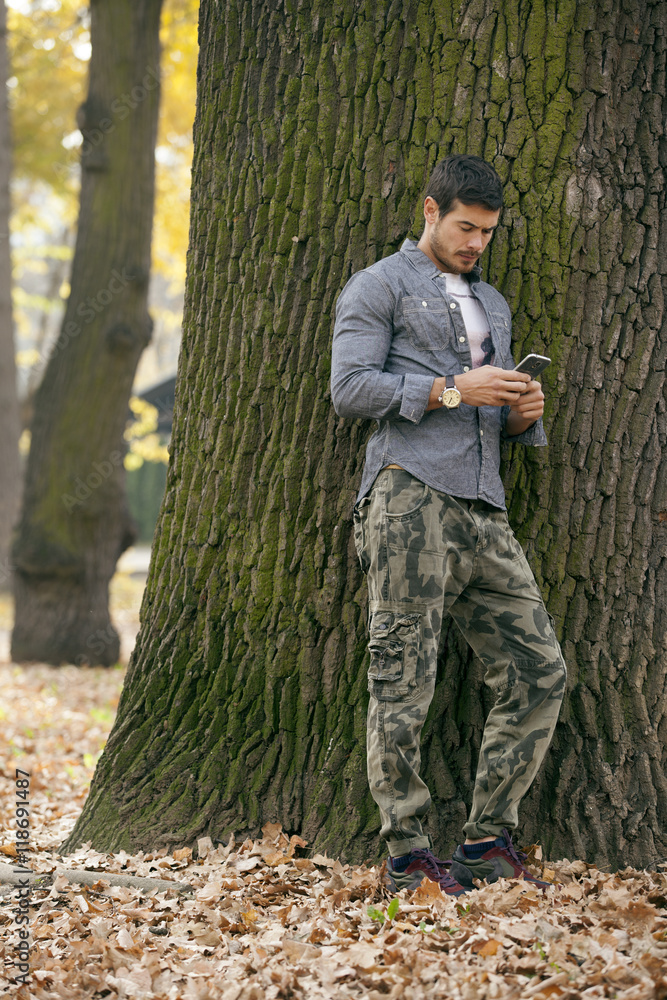 Young Handsome Man Using Mobile Phone Outdoor Young Handsome Man Using Mobile Phone Outdoor