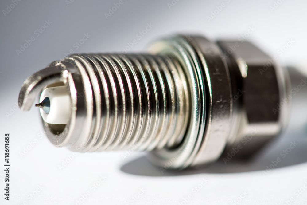 new spark plug isolated on white background new spark plug isolated on white background