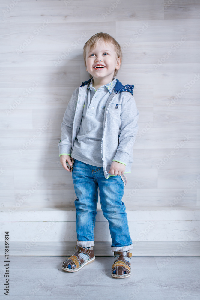 Portrait of little boy in the Studio posing emotions Portrait of little boy in the Studio posing emotions