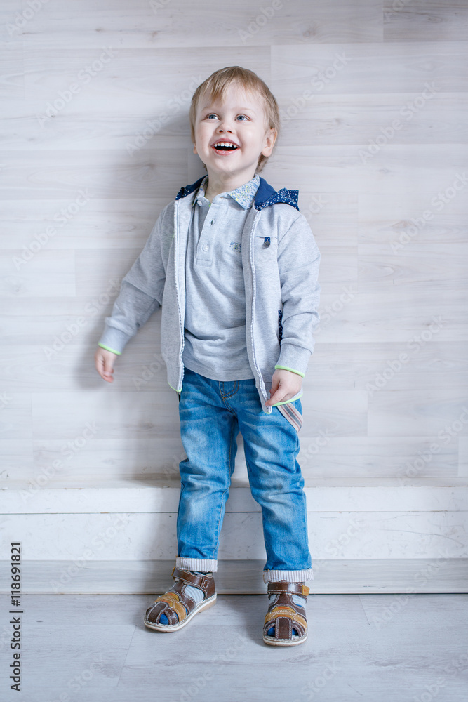 Portrait of little boy in the Studio posing emotions Portrait of little boy in the Studio posing emotions