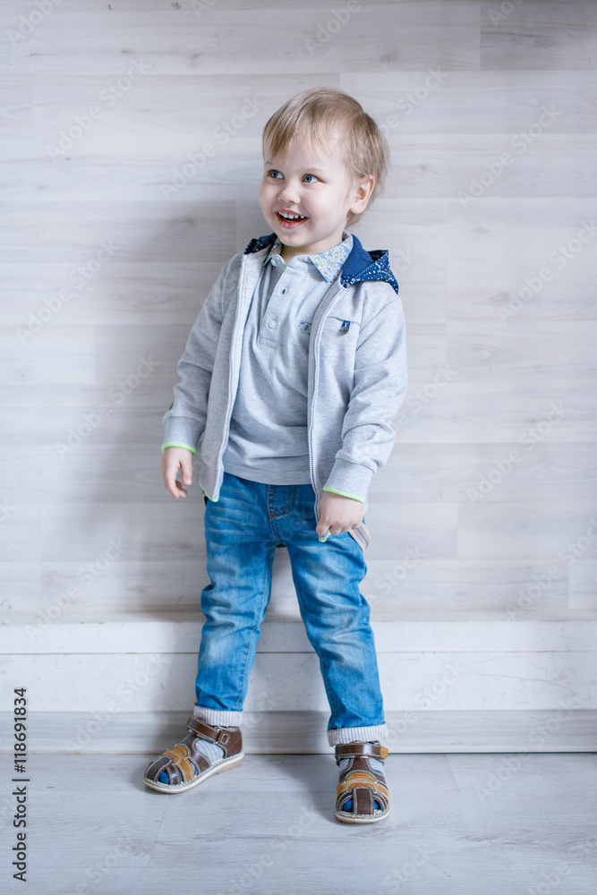Portrait of little boy in the Studio posing emotions Portrait of little boy in the Studio posing emotions