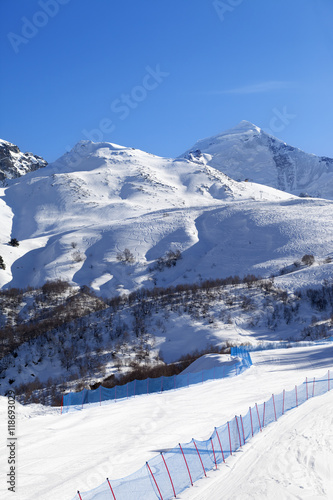 Ski slope in sunny day