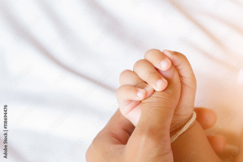 Small delicate little hand of newborn - close portrait Small delicate little hand of newborn - close portrait