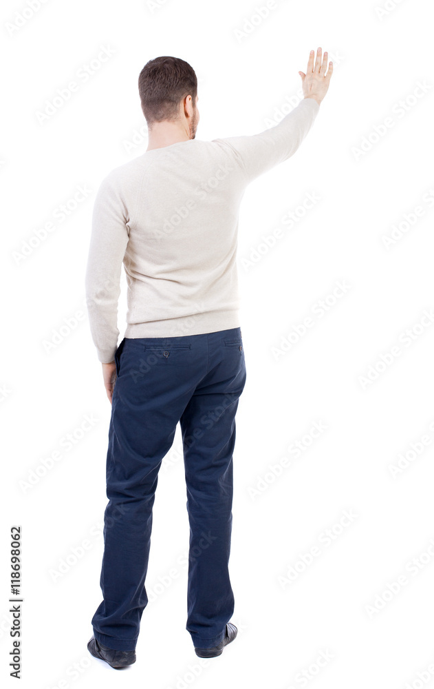 Back view of beautiful business man welcomes. Young businessman in suit. Rear view people collection. backside view of person. Isolated over white background. The bearded man in a white warm Back view of beautiful business man welcomes. Young businessman in suit. Rear view people collection. backside view of person. Isolated over white background. The bearded man in a white warm