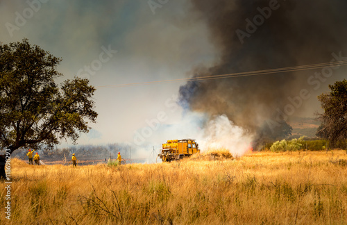 Firefighters fighting fire.