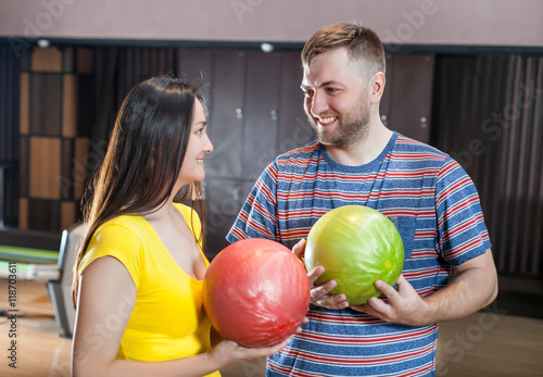 Couple with bowling balls