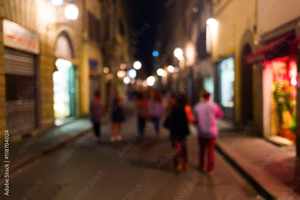 out of focus picture of a night scene in Florence