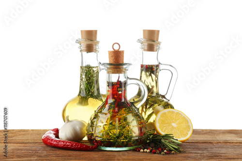 Olive oil with spices, isolated on white