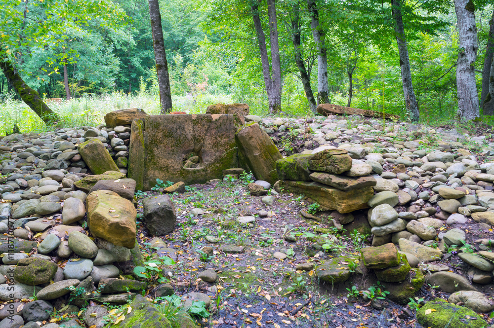 Fototapeta premium The stones of the broken ancient dolmen