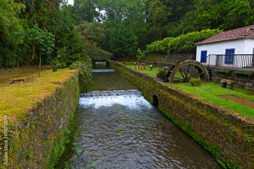 Watermill and gardens in Furnas, Azores. The old watermill at night on Sao Miguel Island, Portugal.