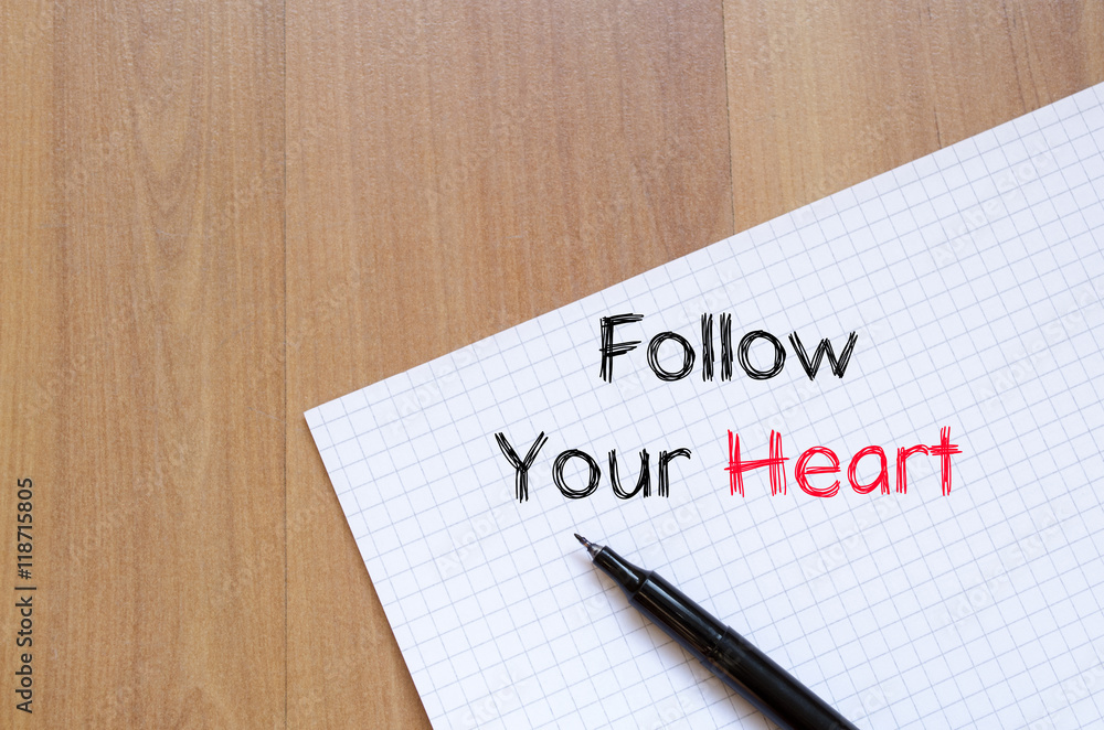 Follow your heart text concept on notebook Follow your heart text concept on notebook