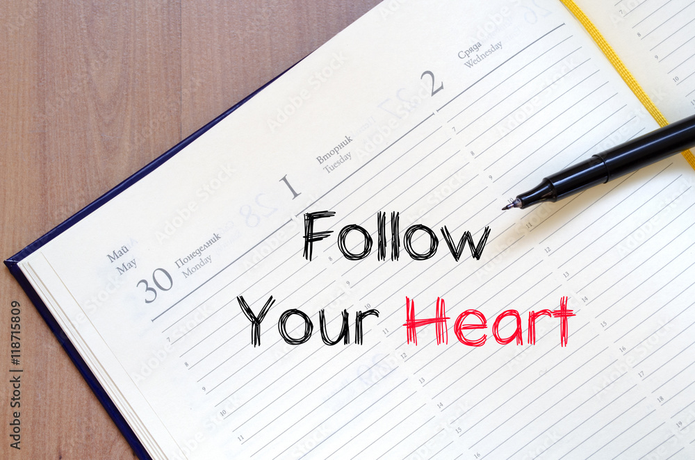 Follow your heart text concept on notebook Follow your heart text concept on notebook