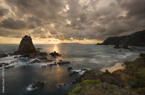 Dramatic Sunset on the Rocky Seaside  photo