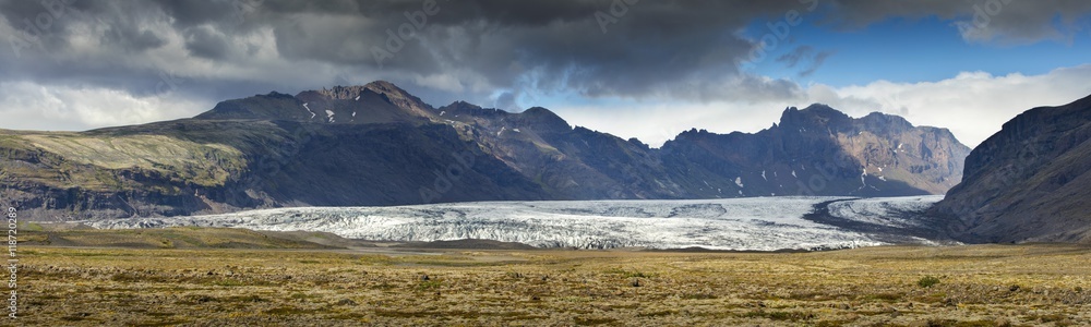 panoramic view to mountain valley with glacier in Iceland