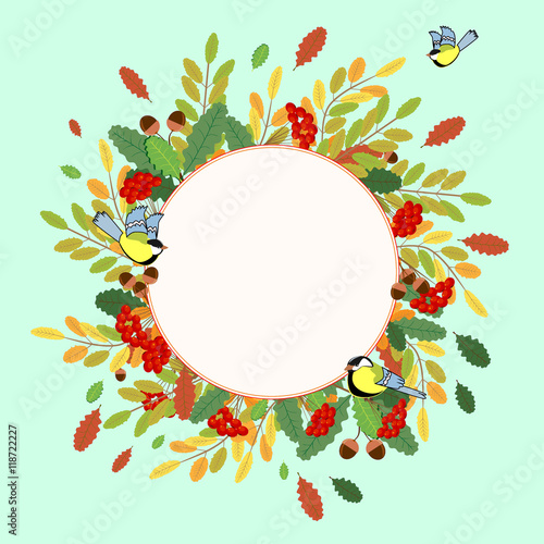 Autumn ornament from Rowan, leaves, nuts and birds Tits
