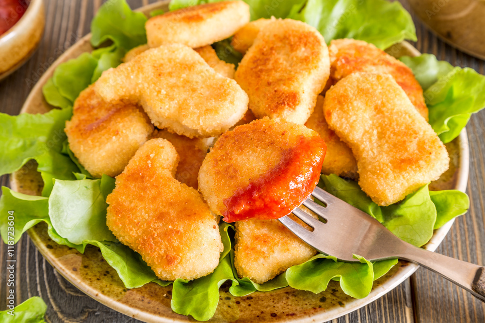 Chicken nuggets with ketchup. Chicken nuggets with ketchup.