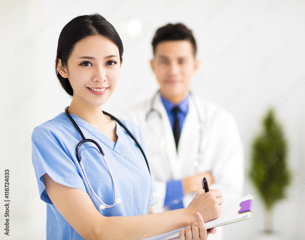 smiling Medical doctors working in the hospital smiling Medical doctors working in the hospital