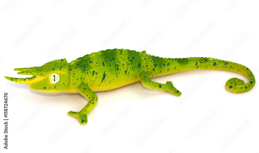 Fototapeta premium Lizard toy on white background.